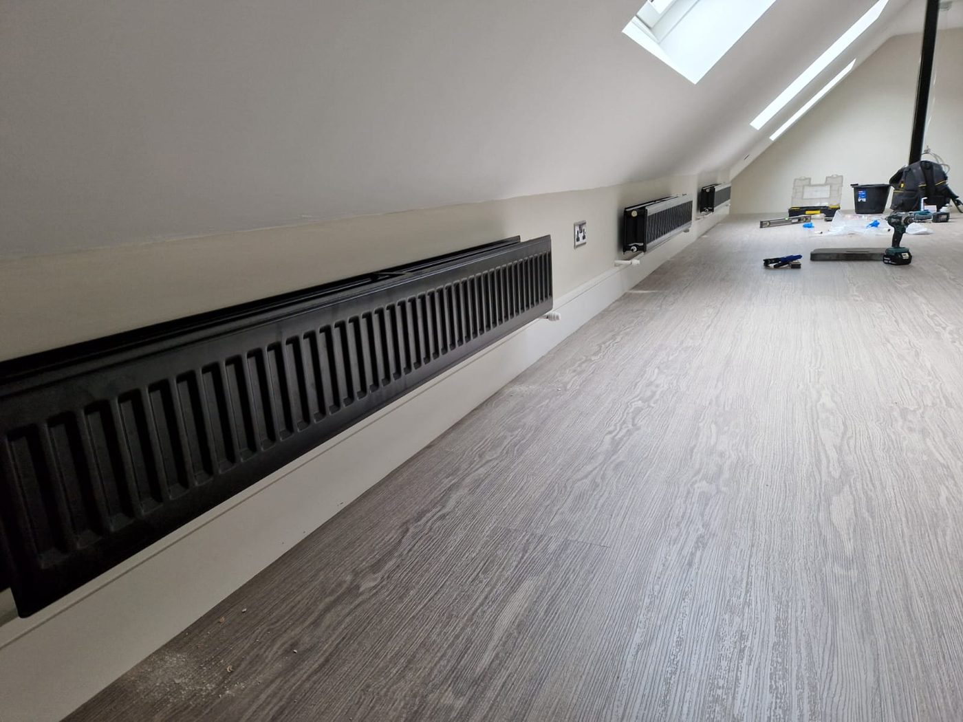 Loft conversion heating — radiators installed